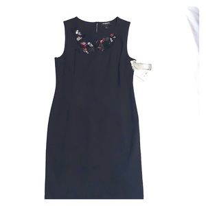 Black Dress with Distinctive Decor Neck line